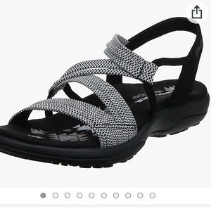 Skechers, size 11. Perfect condition. black/white straps stretch connectors!